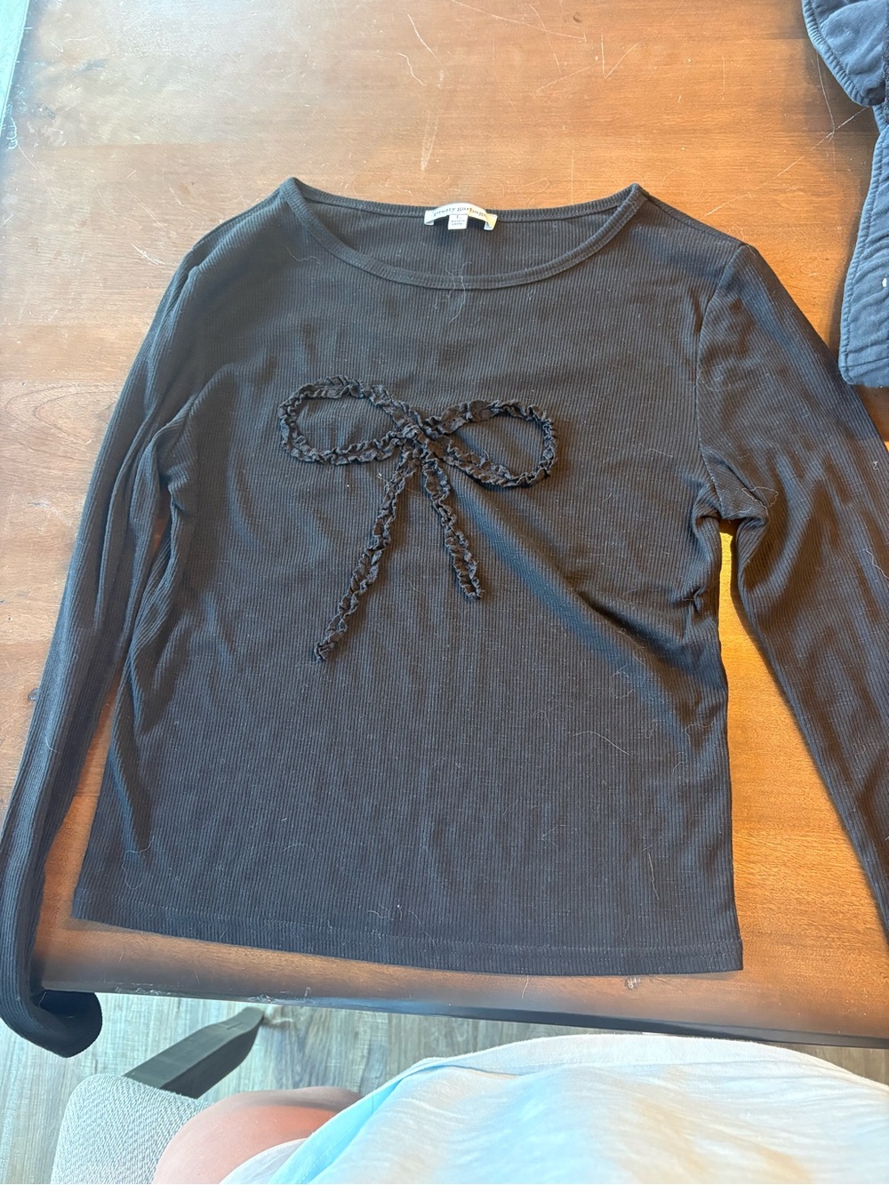 Women's Black Long-Sleeve Knit Top with Bow Accent